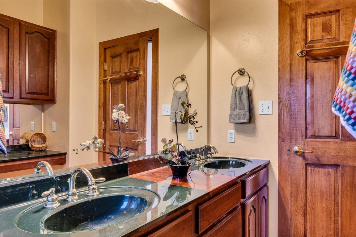1528 Silver Heels Road Fairplay, CO 80440 - Photo 18 of 50 a bathroom with a sink and a mirror