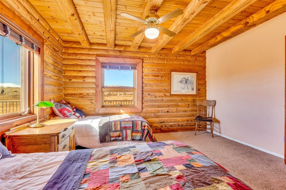 1528 Silver Heels Road Fairplay, CO 80440 - Photo 28 of 50 a bedroom with bed and a window