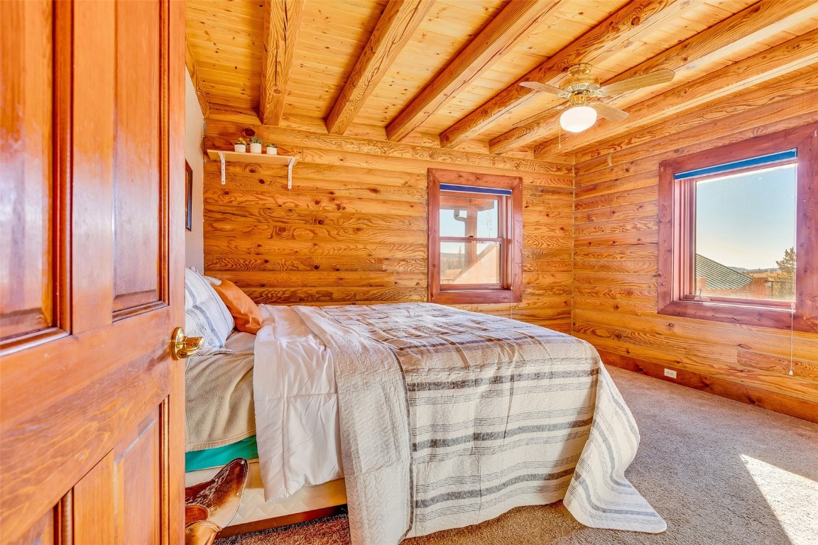 1528 Silver Heels Road Fairplay, CO 80440 - Photo 29 of 50 a bedroom with a bed and a window