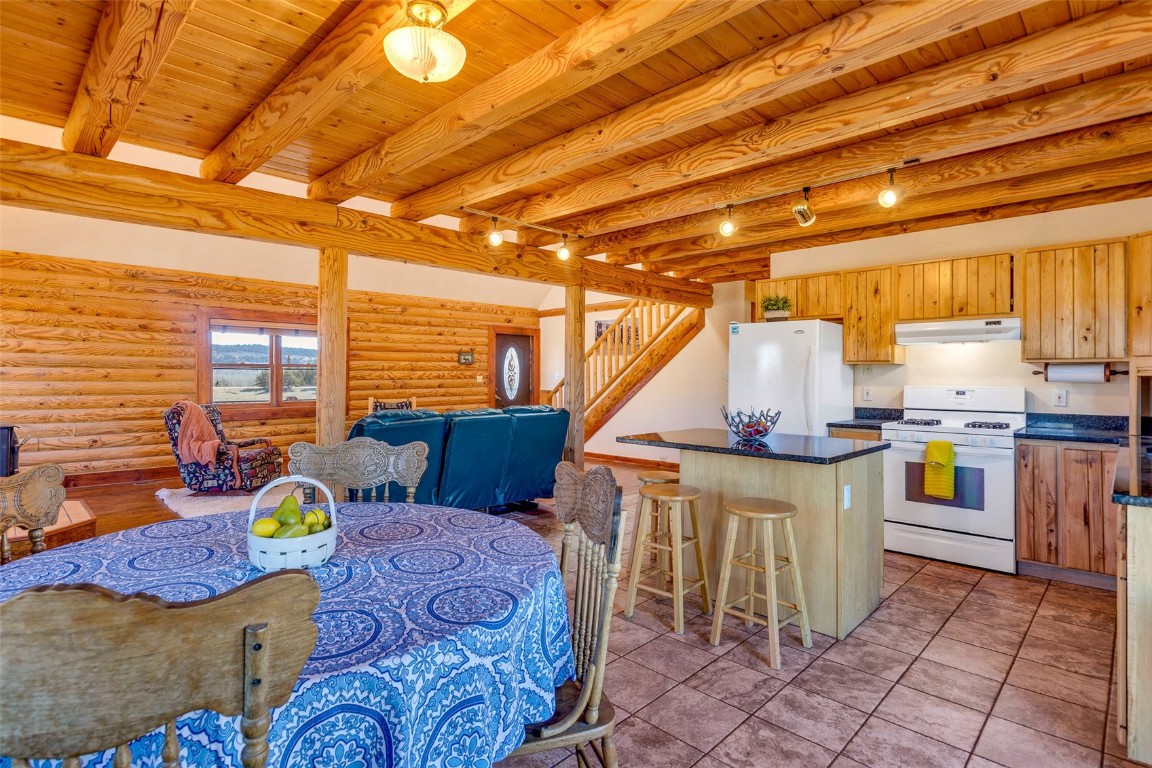1528 Silver Heels Road Fairplay, CO 80440 - Photo 7 of 50 a living room with furniture and a table