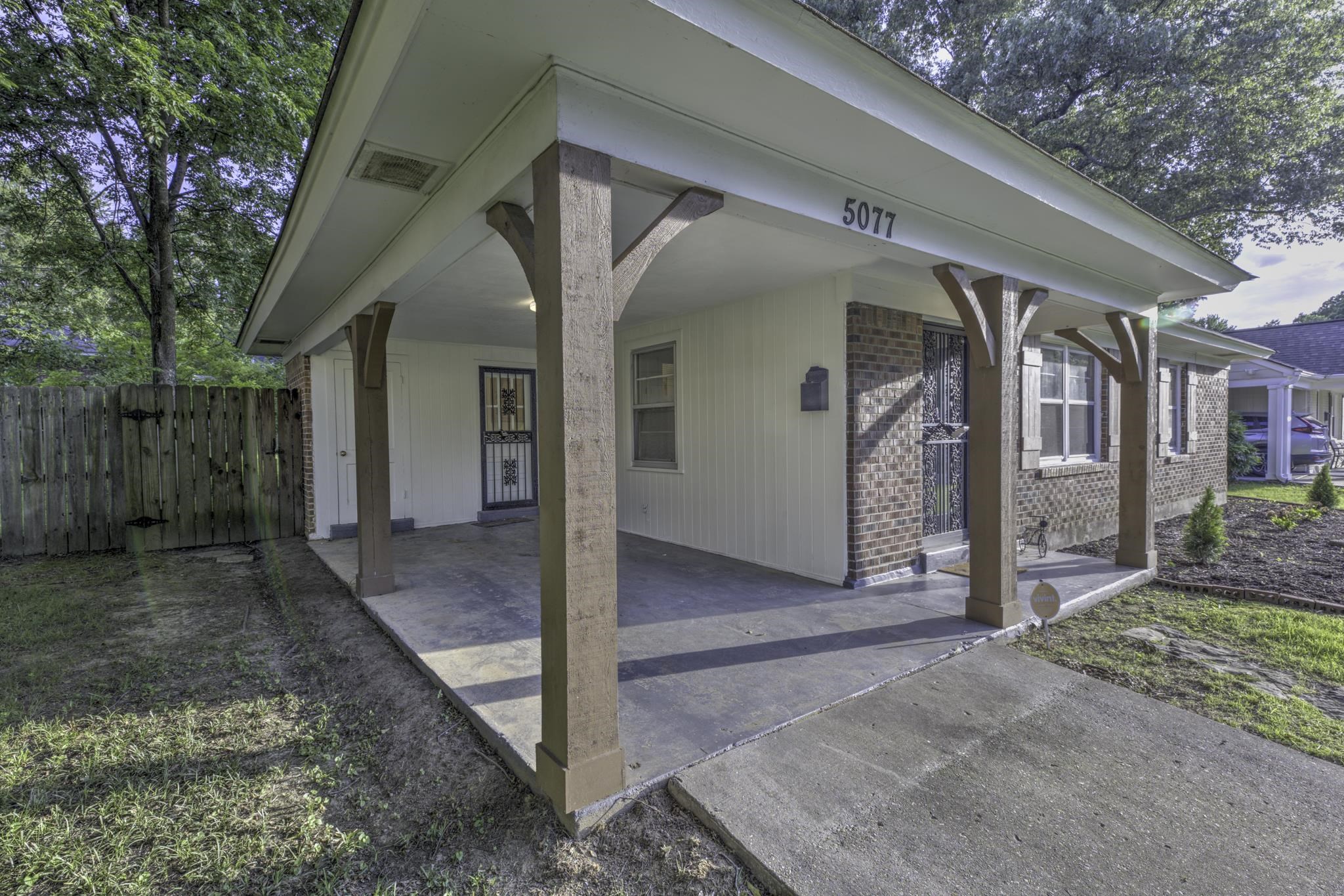 5077 New Castle Road Memphis, TN 38117 - Photo 3 of 37 a view of a house with a yard