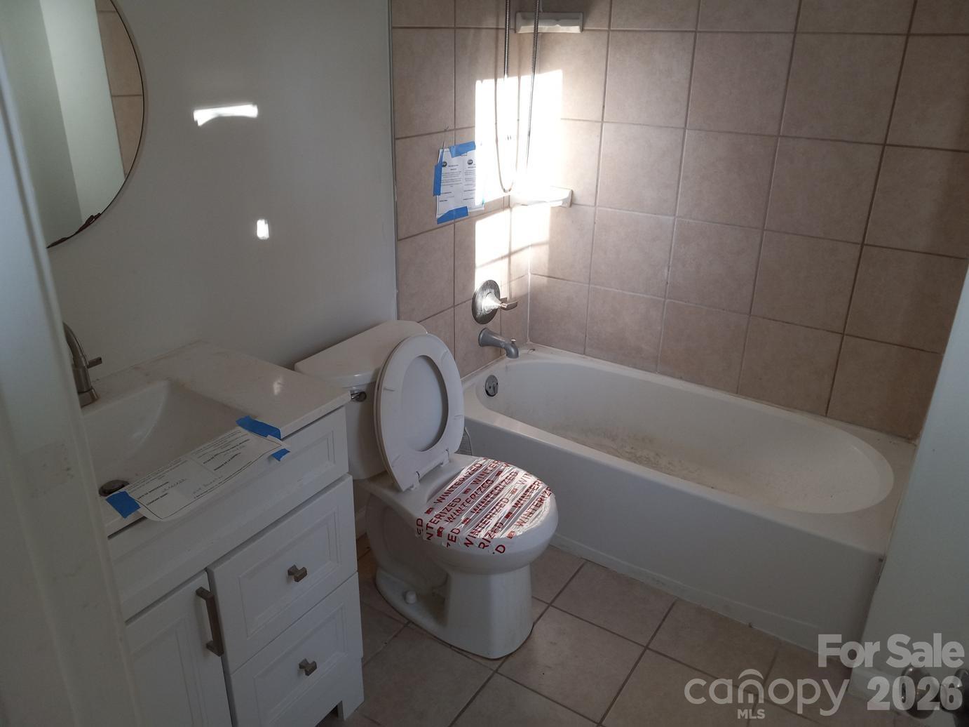 1110 Cherry Mountain Road Shelby, NC 28150 - Photo 19 of 19 a bathroom with a bathtub a toilet and a shower