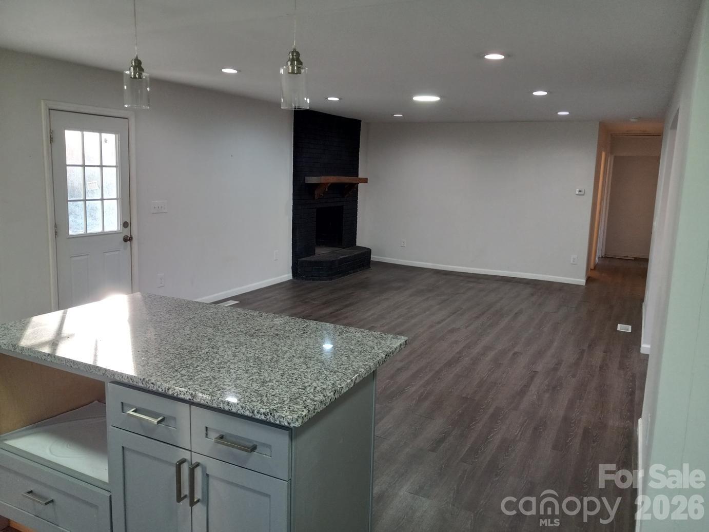 1110 Cherry Mountain Road Shelby, NC 28150 - Photo 8 of 19 wooden floor in an empty room with a window