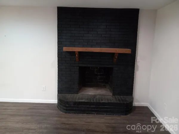 a room with a fireplace