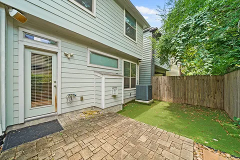 a view of a backyard with a small cabin