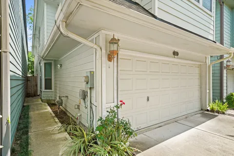 a front view of a house with a garage