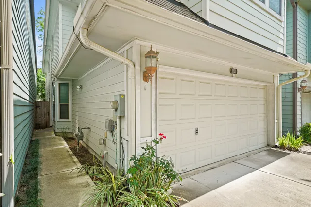 a front view of a house with a garage