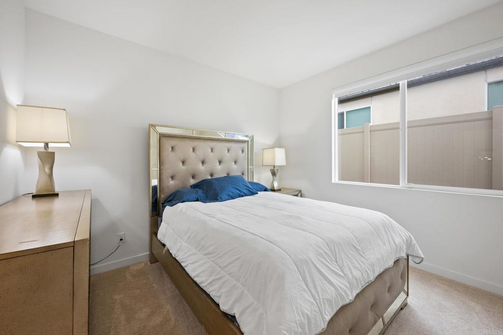 35152 Citrus Lane Fallbrook, CA 92028 - Photo 15 of 34 a bedroom with a bed and a night stand