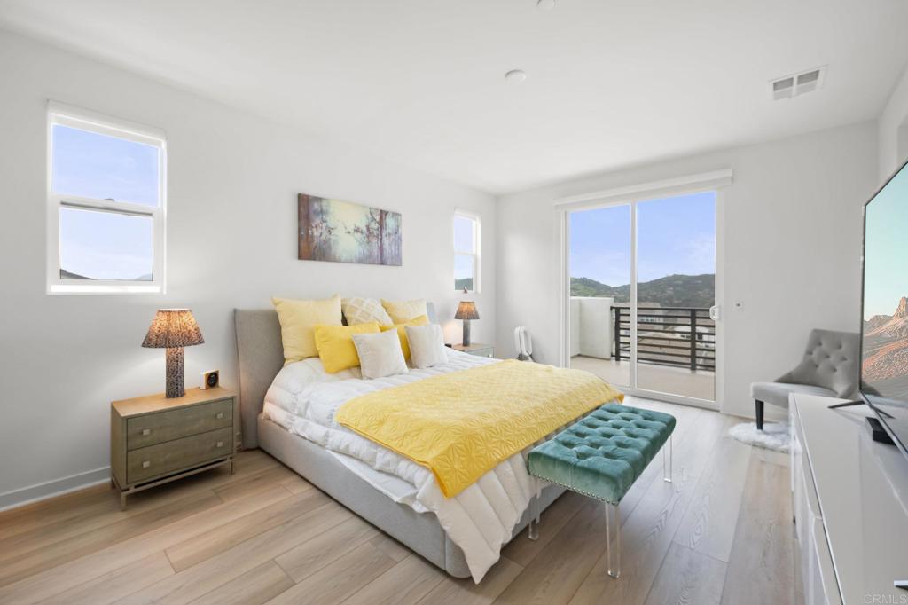 35152 Citrus Lane Fallbrook, CA 92028 - Photo 22 of 34 a bedroom with a bed and a view of kitchen