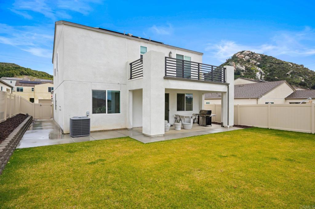 35152 Citrus Lane Fallbrook, CA 92028 - Photo 32 of 34 a front view of a house with swimming pool and porch