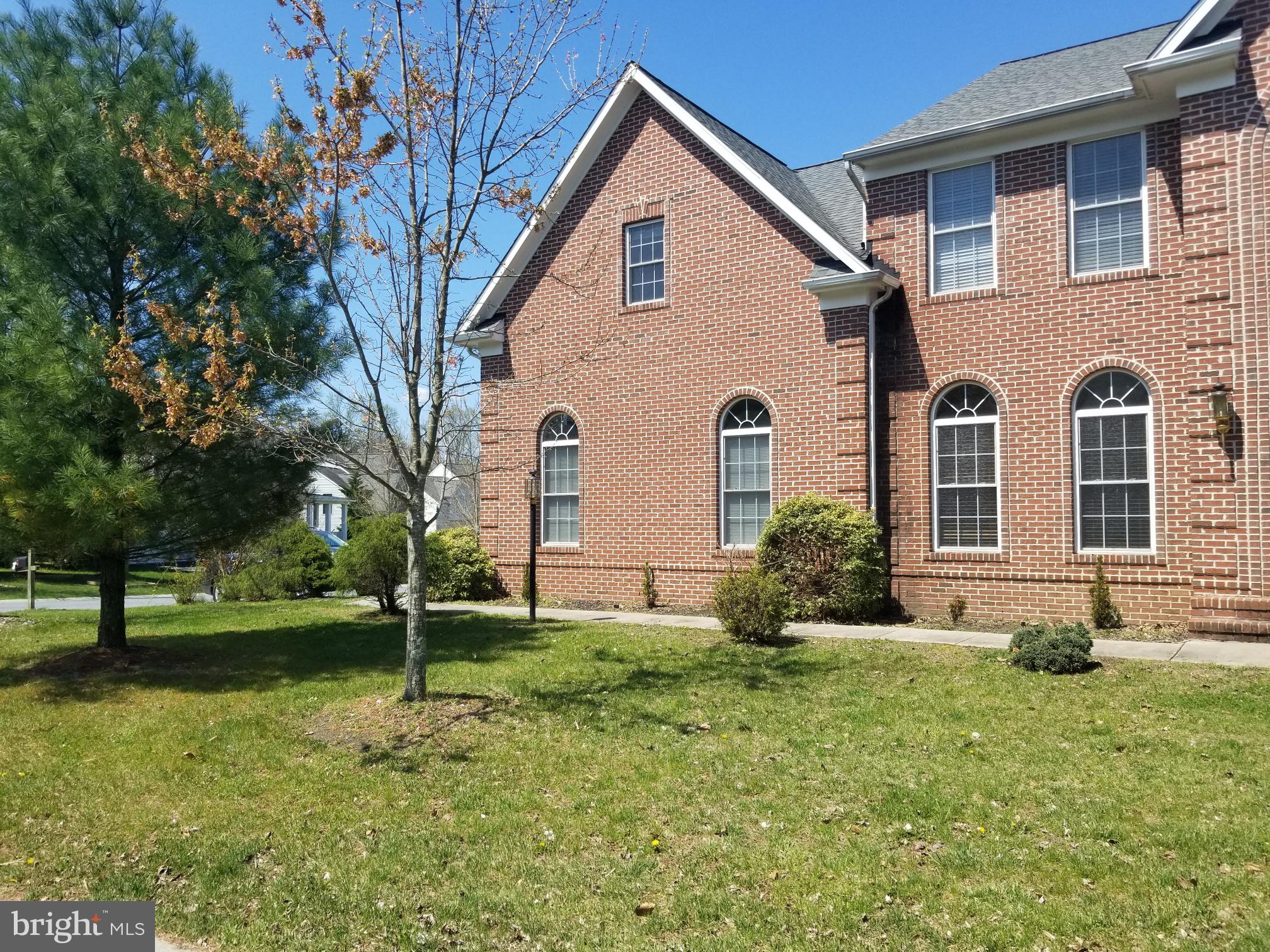 3943 Nelson House Road Ellicott City, MD 21043 - Photo 2 of 61 a view of a house with backyard and trees