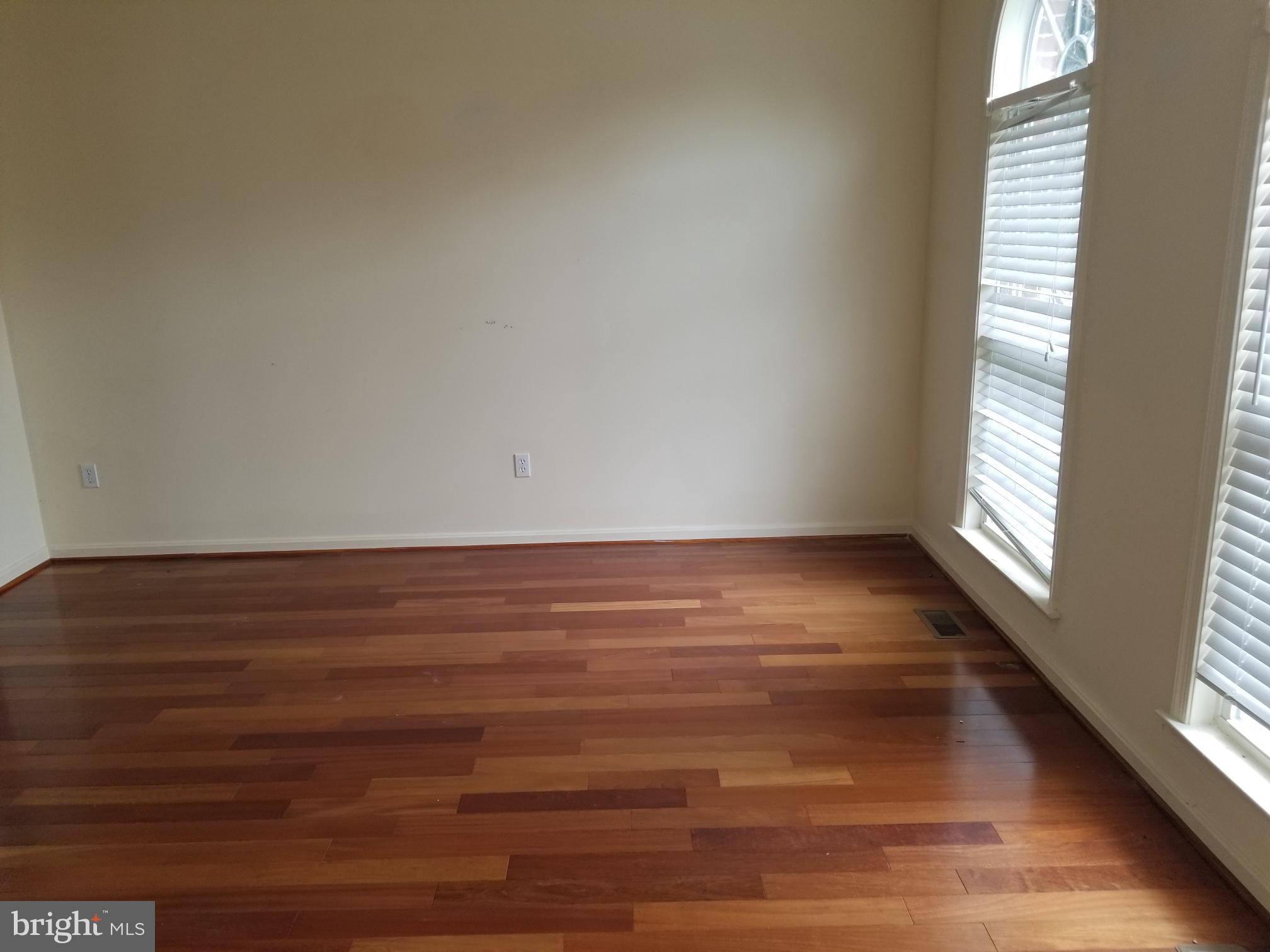 3943 Nelson House Road Ellicott City, MD 21043 - Photo 13 of 61 a view of room with window and wooden floor