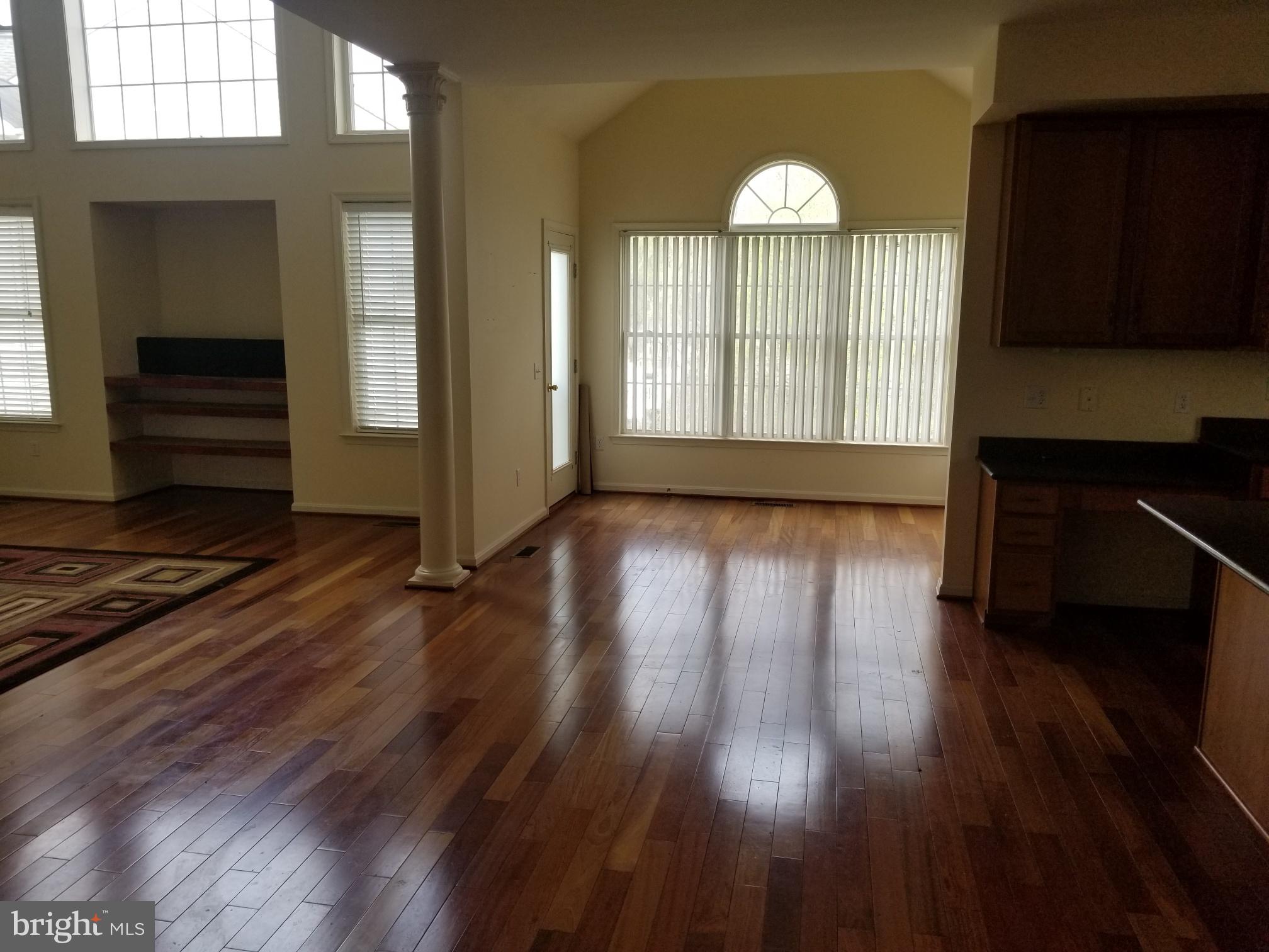 3943 Nelson House Road Ellicott City, MD 21043 - Photo 19 of 61 a view of empty room with wooden floor and fan