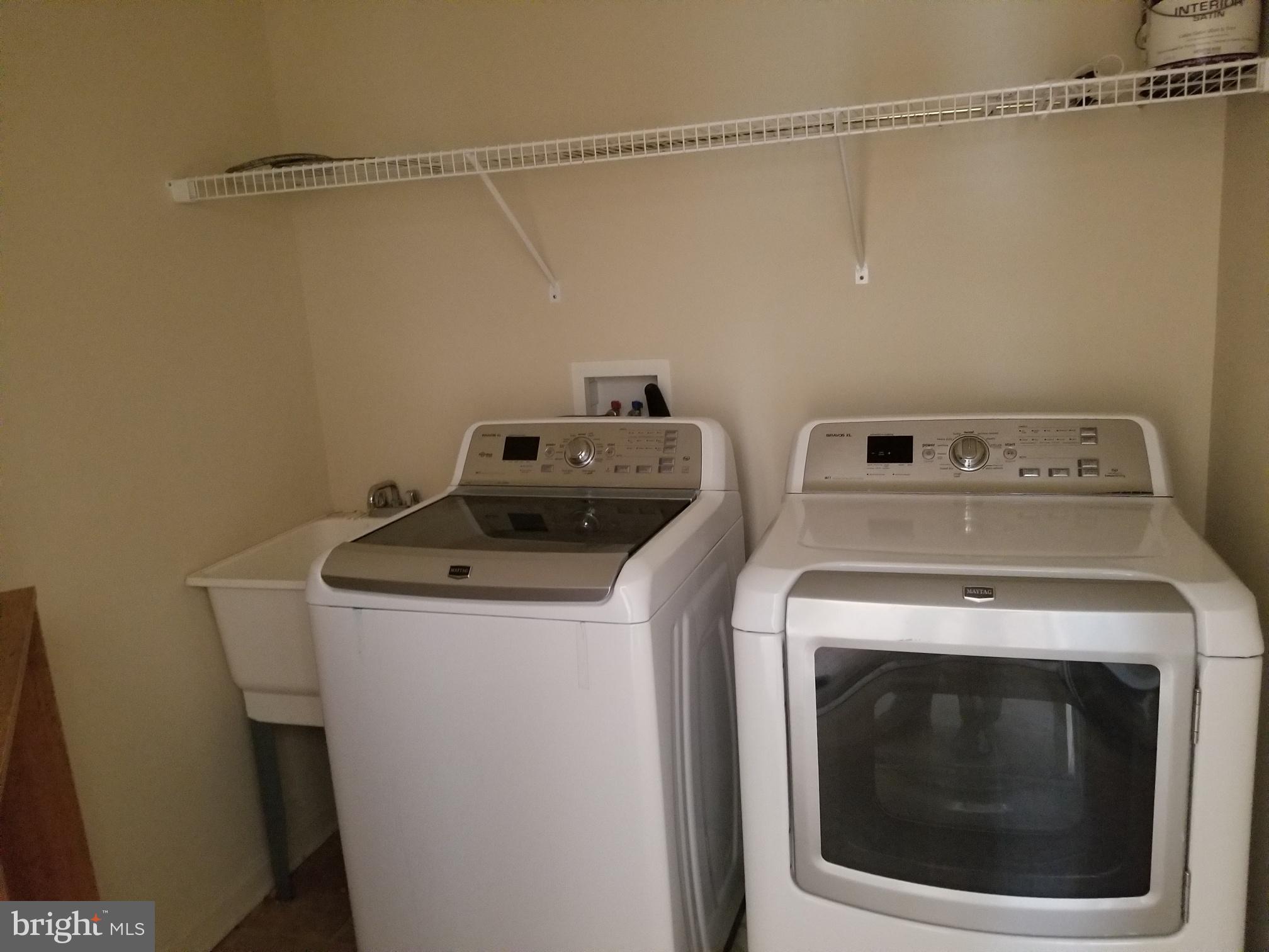 3943 Nelson House Road Ellicott City, MD 21043 - Photo 38 of 61 a utility room with dryer and washer