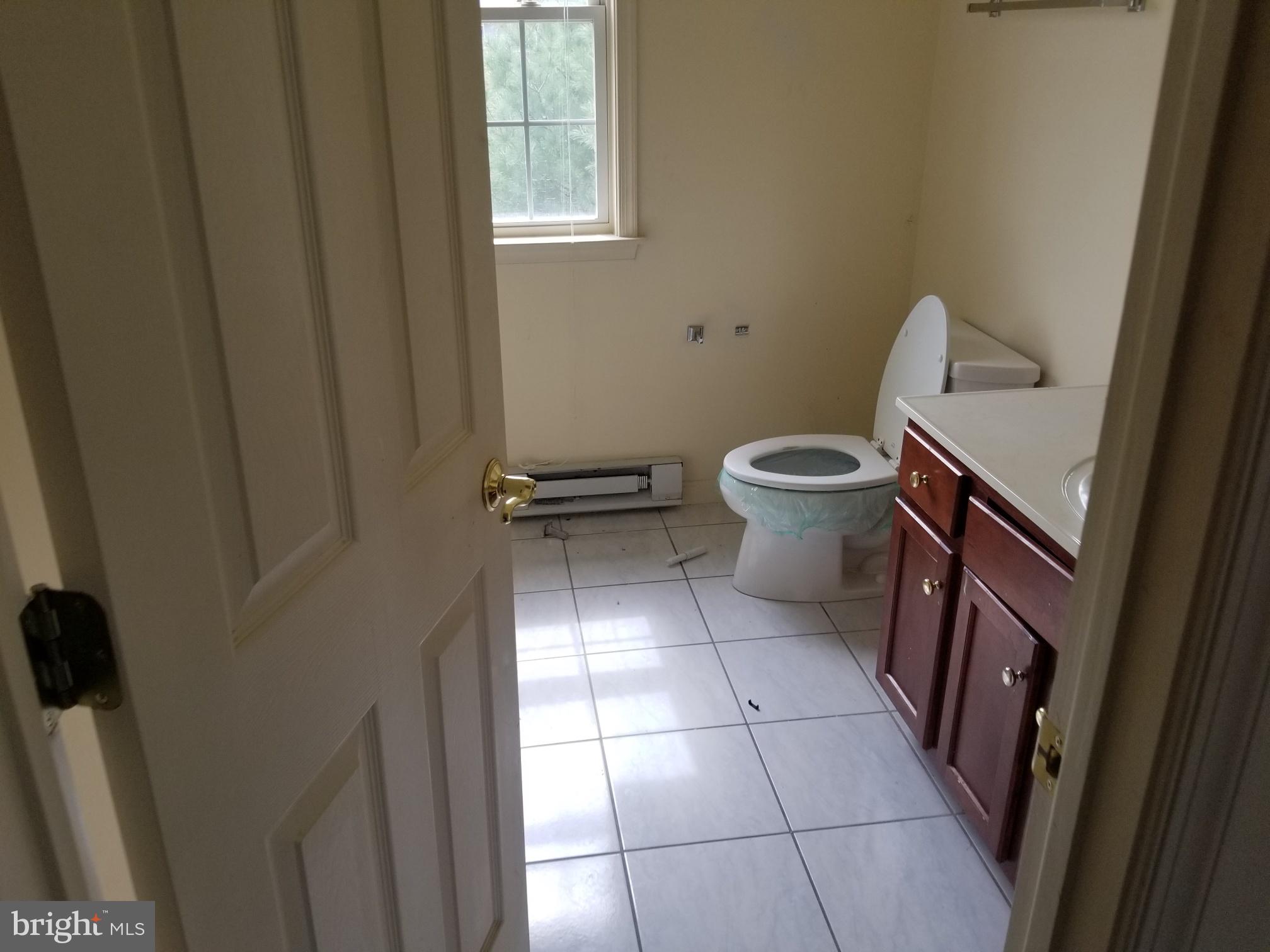 3943 Nelson House Road Ellicott City, MD 21043 - Photo 52 of 61 a bathroom with a toilet and a shower