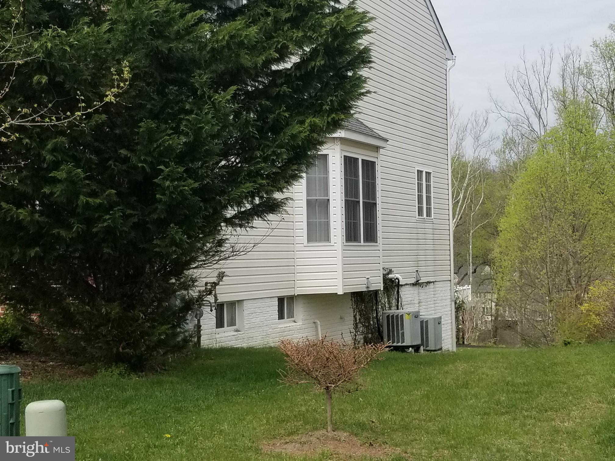 3943 Nelson House Road Ellicott City, MD 21043 - Photo 61 of 61 a view of a house with a yard