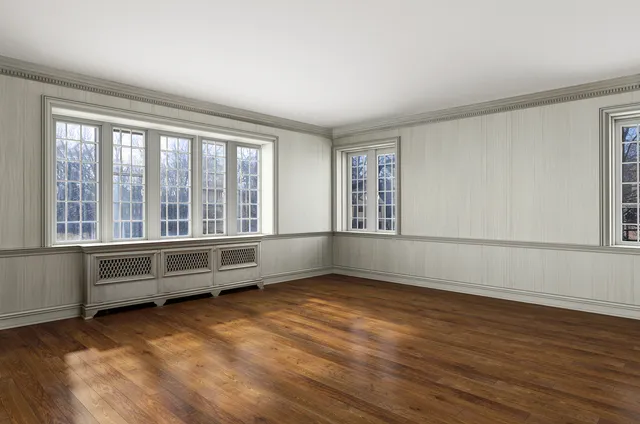a bathroom with a shower and a sink