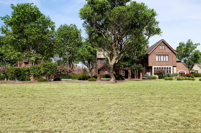 a house with trees in front of it