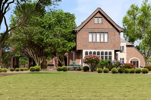 a front view of a house with garden