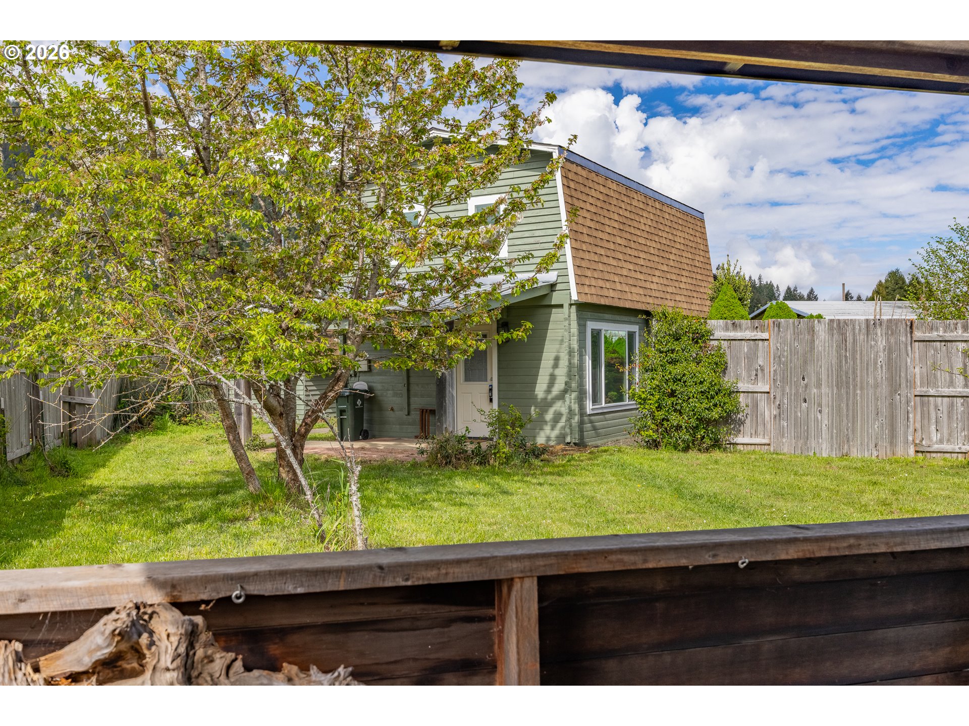 1250 North 3rd Avenue Powers, OR 97466 - Photo 11 of 48 a view of a backyard with plants