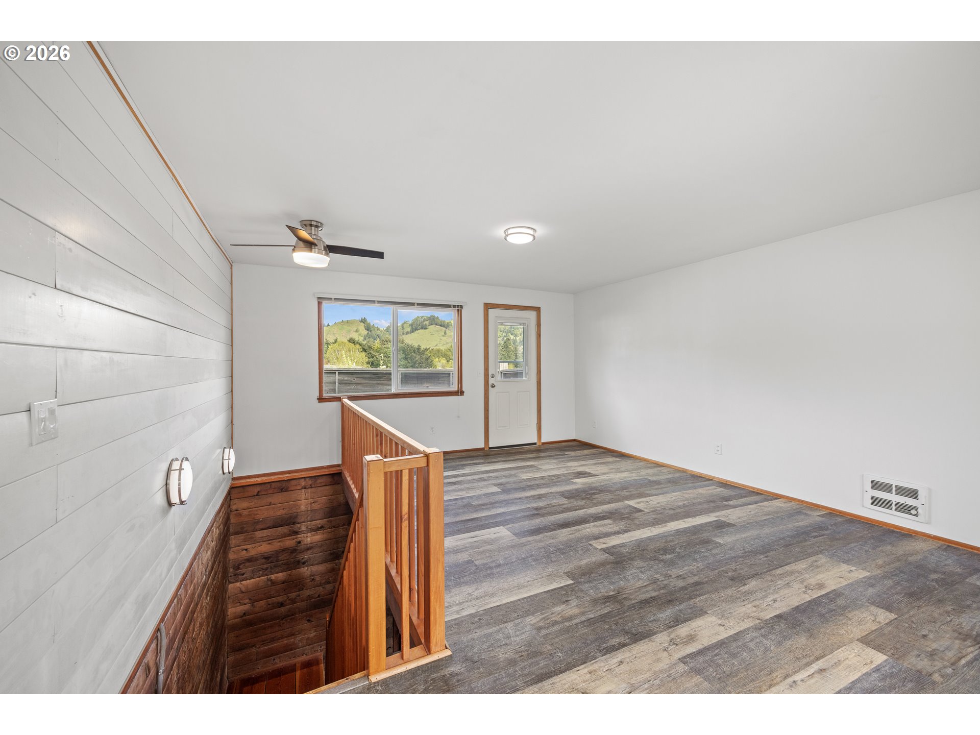1250 North 3rd Avenue Powers, OR 97466 - Photo 28 of 48 a view of a bedroom with wooden floor