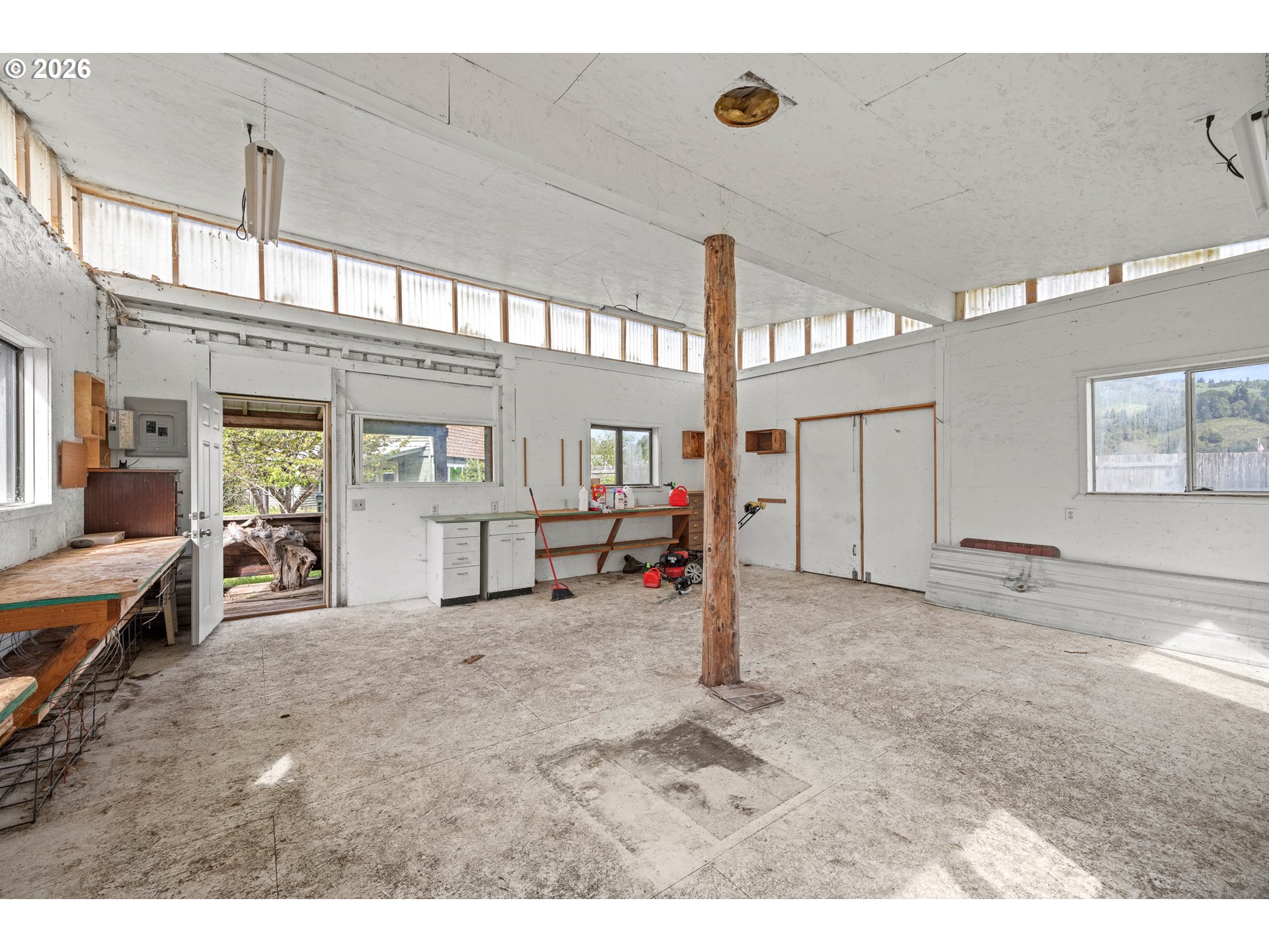 1250 North 3rd Avenue Powers, OR 97466 - Photo 39 of 48 a view of a livingroom with furniture and windows