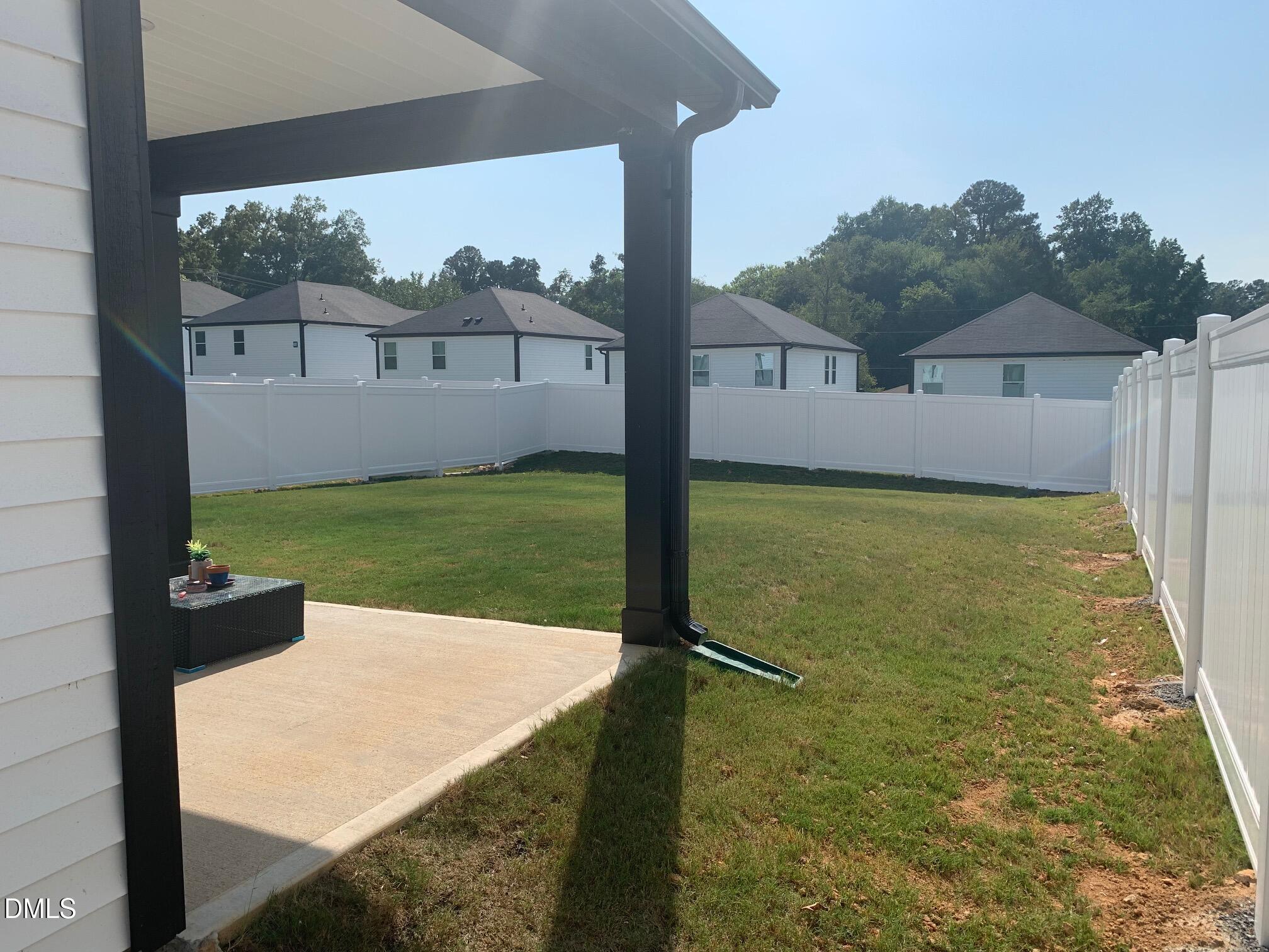 422 Diversity Way Raleigh, NC 27610 - Photo 5 of 10 a view of a back yard of the house