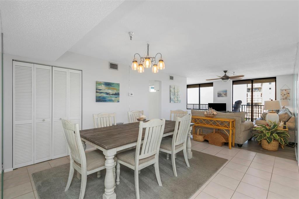 15316 Gulf Boulevard, Unit 604 Madeira Beach, FL 33708 - Photo 23 of 82 a dining room with furniture and window