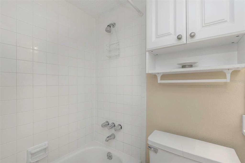 15316 Gulf Boulevard, Unit 604 Madeira Beach, FL 33708 - Photo 44 of 82 a bathroom with a toilet and a bathtub