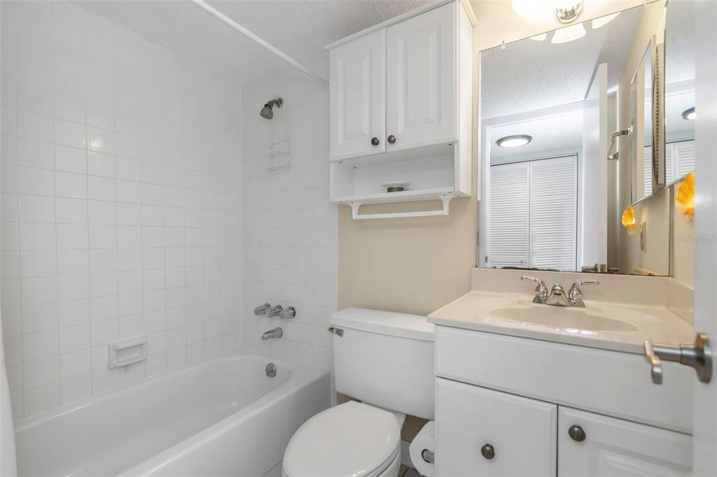 15316 Gulf Boulevard, Unit 604 Madeira Beach, FL 33708 - Photo 45 of 82 a bathroom with a sink toilet and bathtub