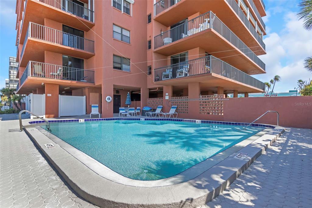 15316 Gulf Boulevard, Unit 604 Madeira Beach, FL 33708 - Photo 56 of 82 a view of a building with a yard