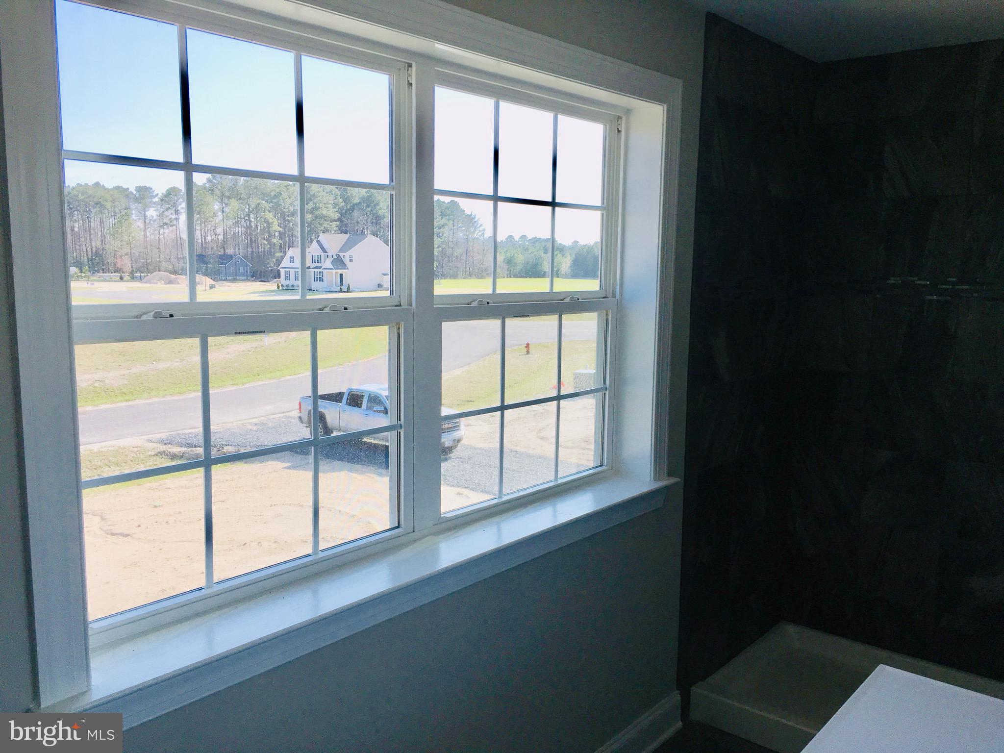 9 Patriots Way Georgetown, DE 19947 - Photo 66 of 67 a view of an empty room with a window