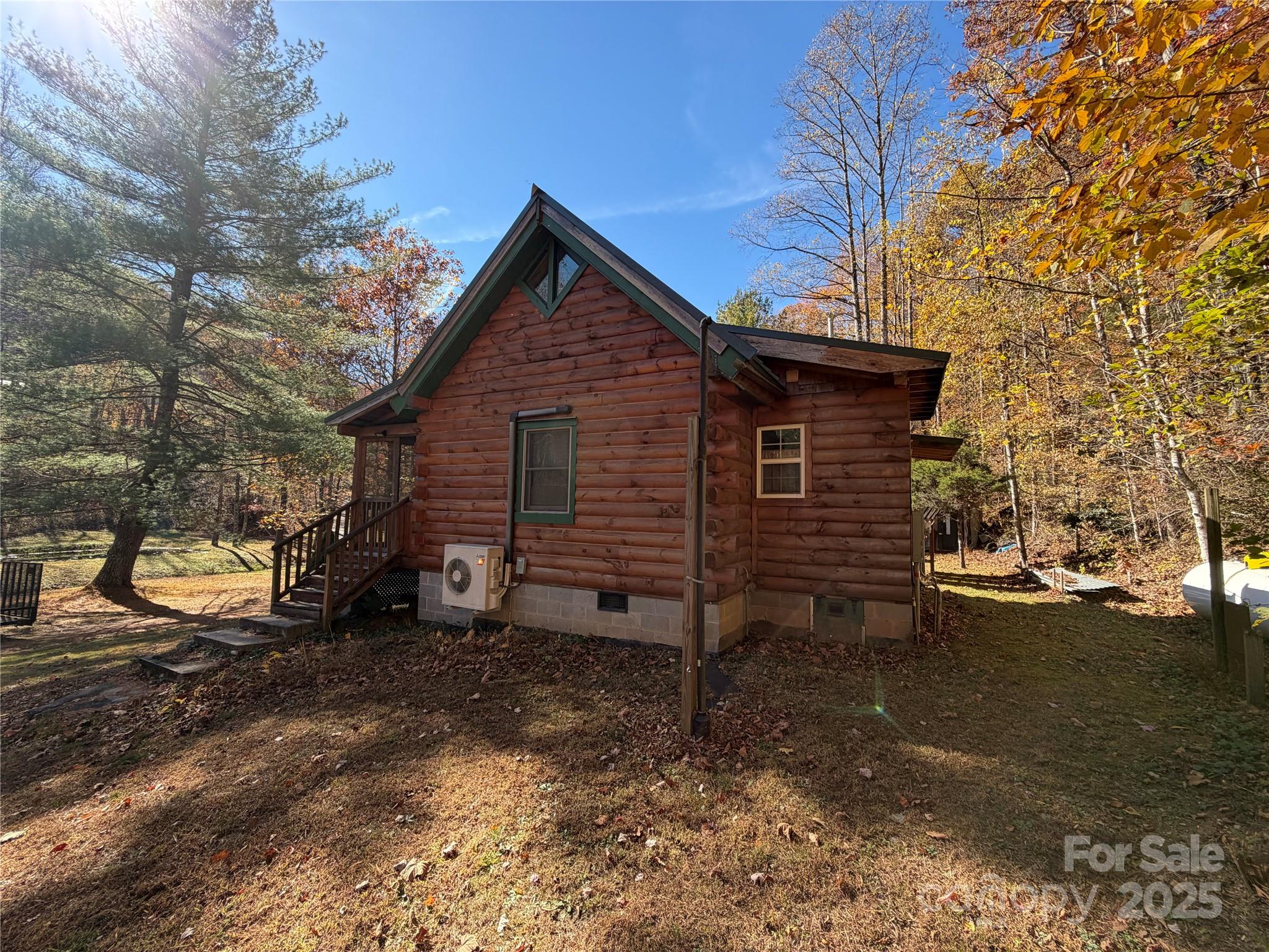 1917 Longbottom Road McGrady, NC 28649 - Photo 15 of 32 a view of a house with a yard