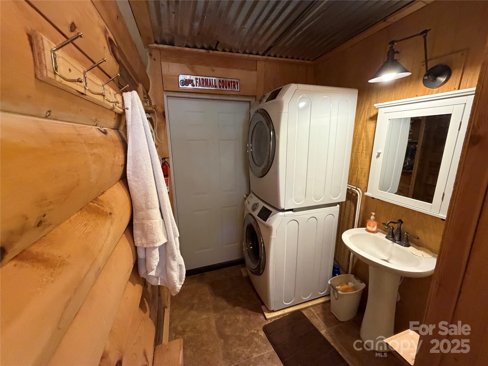 1917 Longbottom Road McGrady, NC 28649 - Photo 23 of 32 a bathroom with a sink toilet and shower