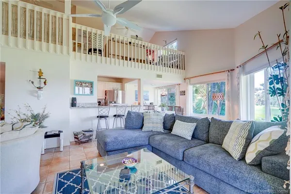 a kitchen with stainless steel appliances granite countertop a stove microwave and sink