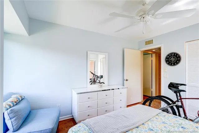 a view of a room with lots of white furniture