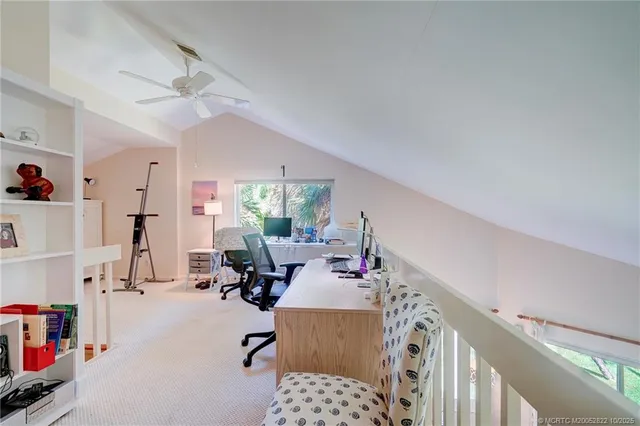 a view of yard with swimming pool and trees