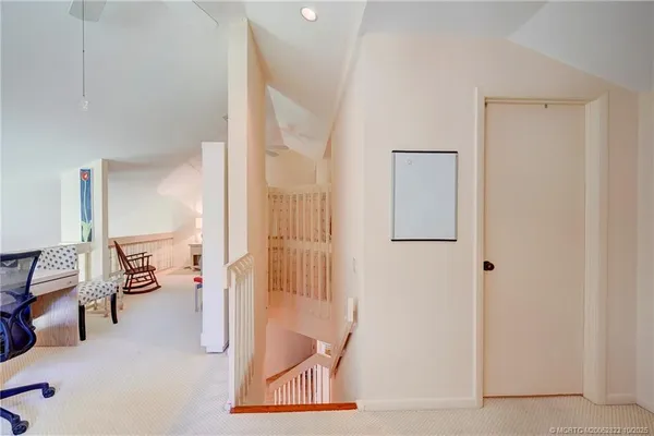 a view of house with a big yard