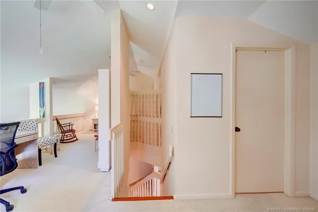 a view of house with a big yard