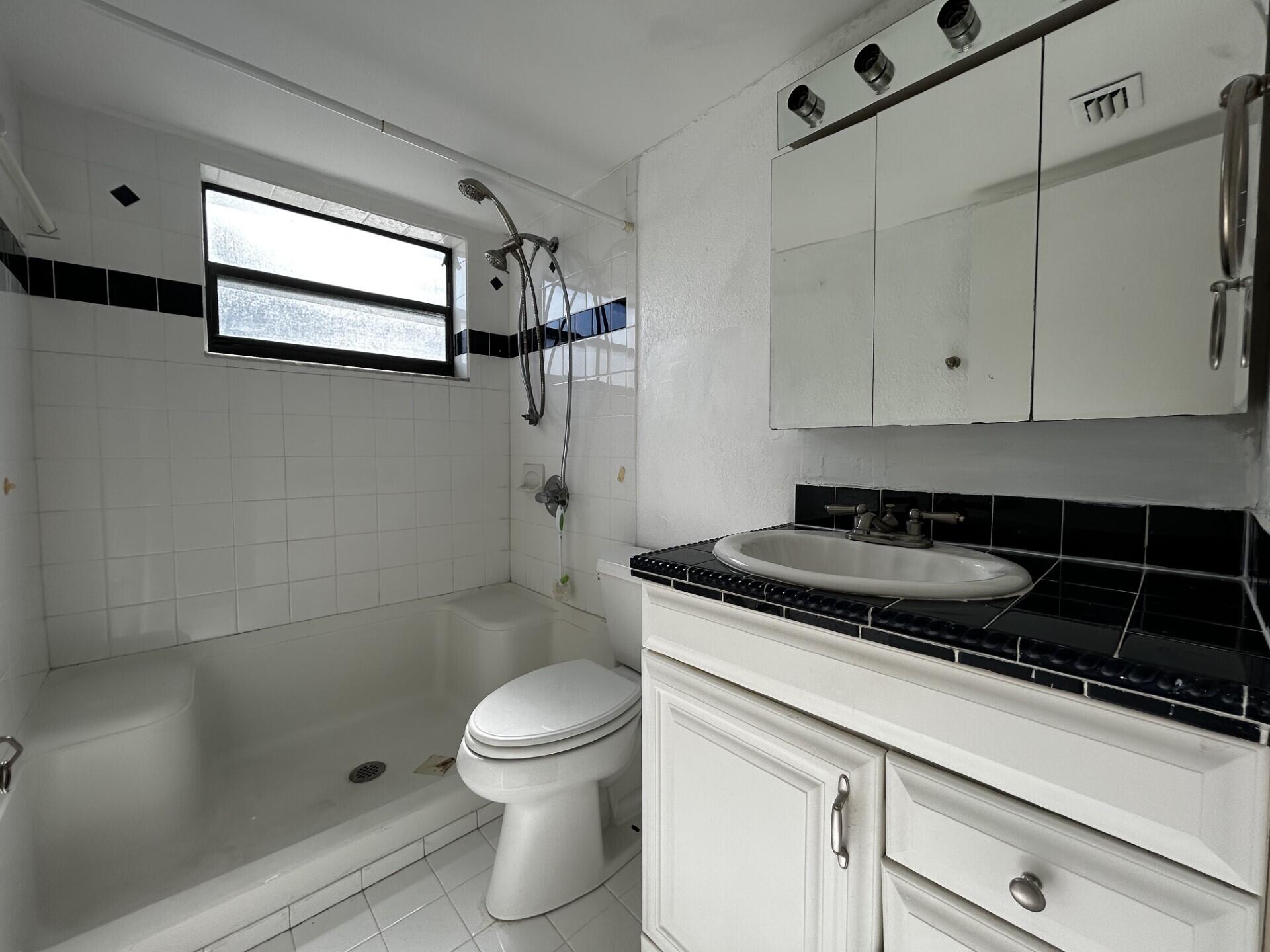 3252 Foxcroft Road, Unit 202 Miramar, FL 33025 - Photo 15 of 23 Guest Bathroom