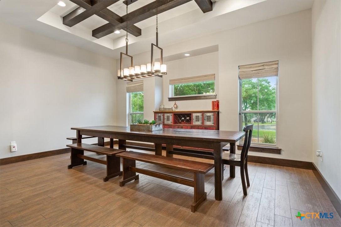 569 Messer Ranch Road Belton, TX 76513 - Photo 12 of 48 a view of a dining room with furniture window and wooden floor