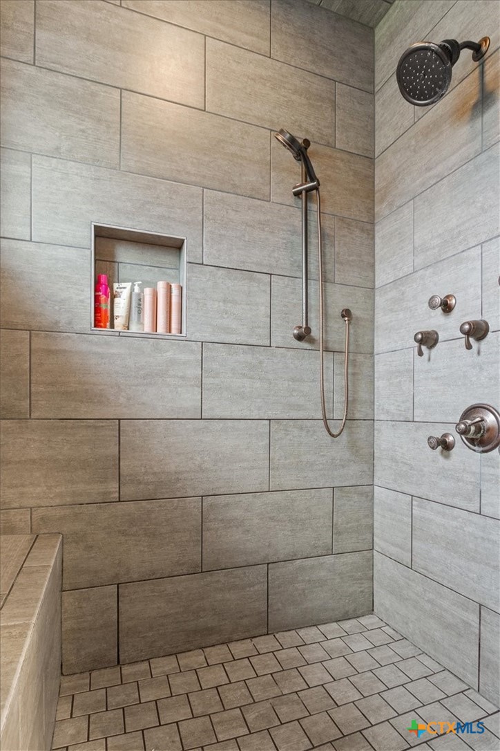 569 Messer Ranch Road Belton, TX 76513 - Photo 19 of 48 a bathroom with a shower