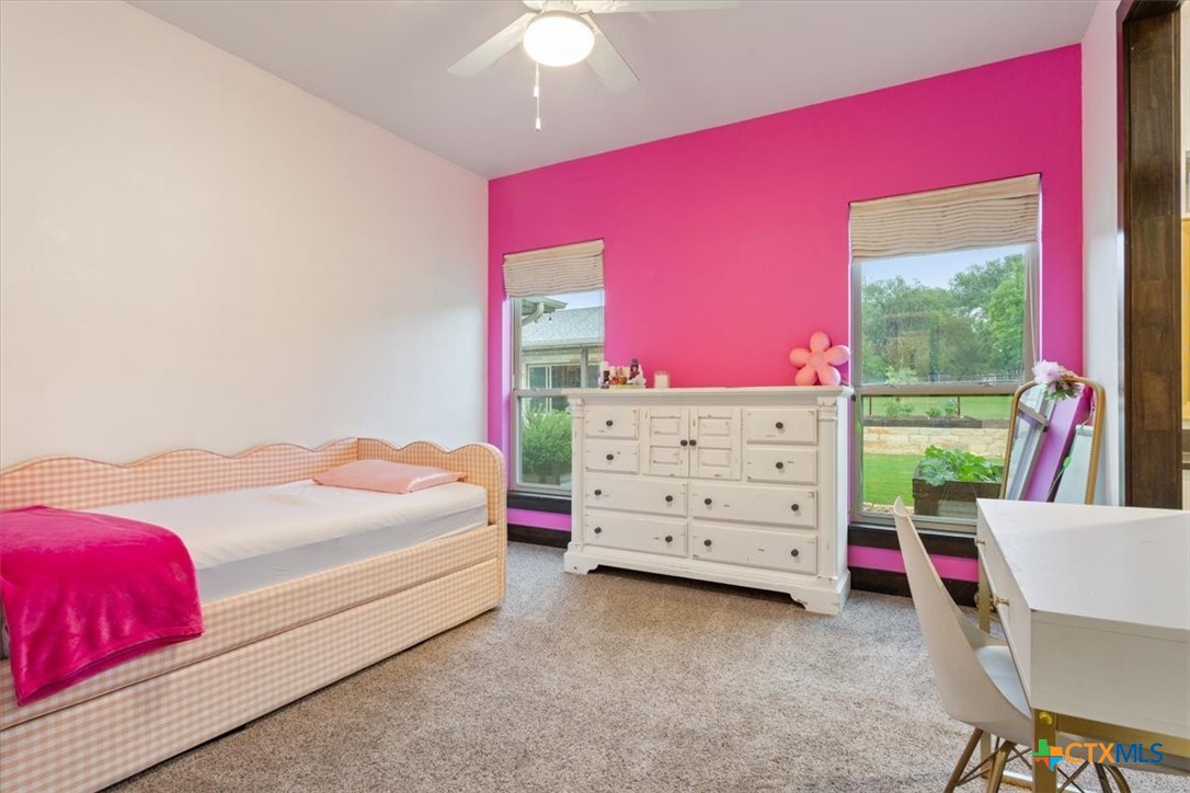 569 Messer Ranch Road Belton, TX 76513 - Photo 29 of 48 a bedroom with a bed and a dresser