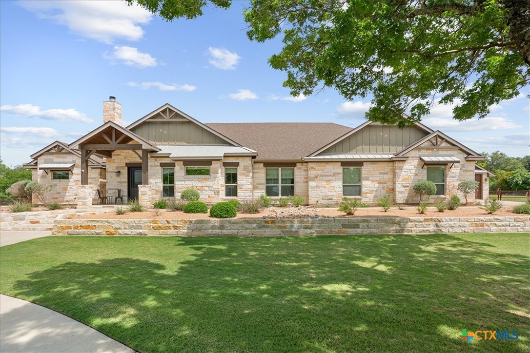 569 Messer Ranch Road Belton, TX 76513 - Photo 4 of 48 a front view of a house with a yard patio and swimming pool
