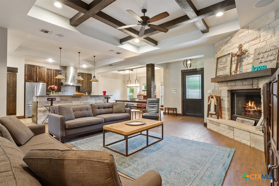 569 Messer Ranch Road Belton, TX 76513 - Photo 7 of 48 a living room with furniture and a fireplace