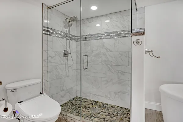 a bathroom with a sink and vanity