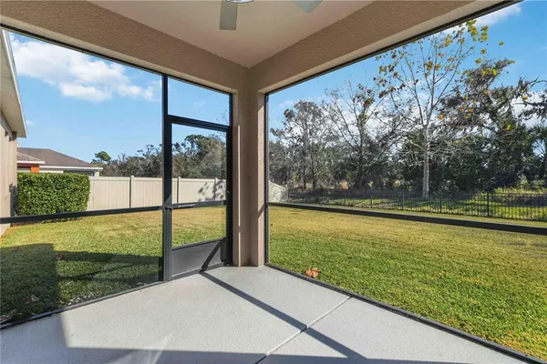 a view of a large window with an outdoor space