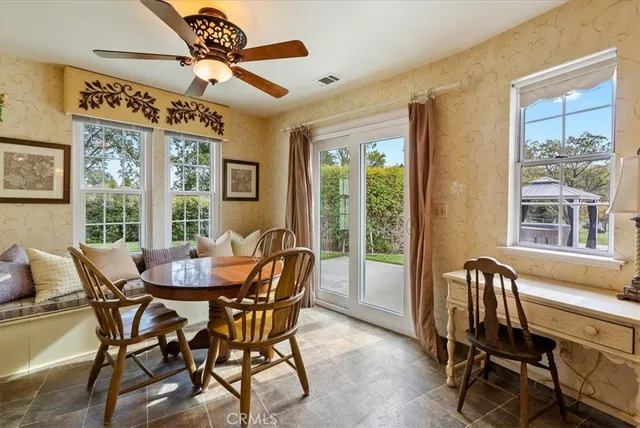 a spacious bedroom with a bed and window