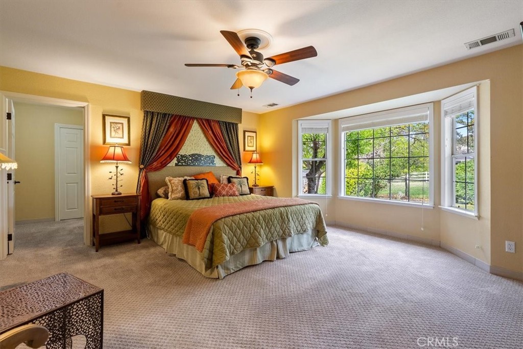 1505 Barley Grain Road Paso Robles, CA 93446 - Photo 17 of 56 a spacious bedroom with a bed and window