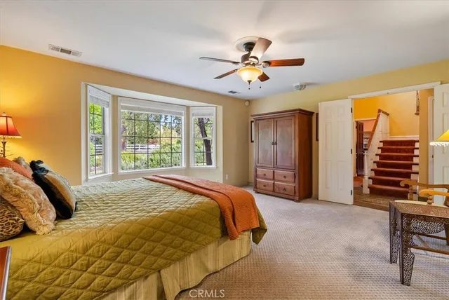 a bathroom with a granite countertop sink mirror and a